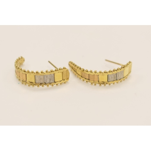 414 - Pair of unmarked yellow metal three colour crescent shaped earrings, gross weight approx. 3g