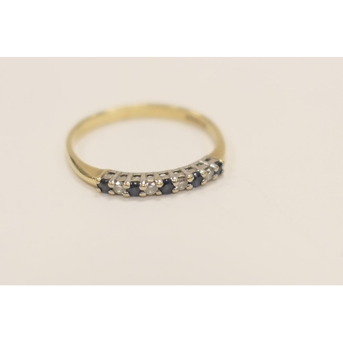 427 - Sapphire and diamond half eternity ring in 9ct gold set with nine tiny round cut gems. ring size Q, ... 