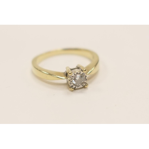 431 - Diamond solitaire ring, the round cut stone of approx. 0.15ct, illusion set on a 9ct yellow gold rin... 