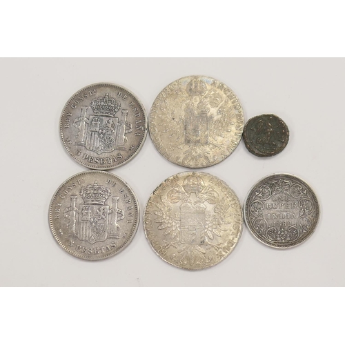 467 - Two silver thalers, bronze Roman coin, Spanish five pesetas 1888 x 2 and an Indian rupee 1862