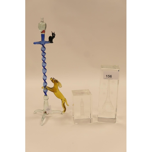 156 - Michael Knight of Hastings, free blown glass ornament featuring a dog chasing a cat up a lamp post; ... 