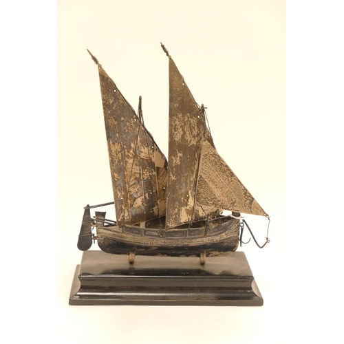 272 - Sterling silver model of a sailing junk mounted on a plinth base, marked 925, height 20cm