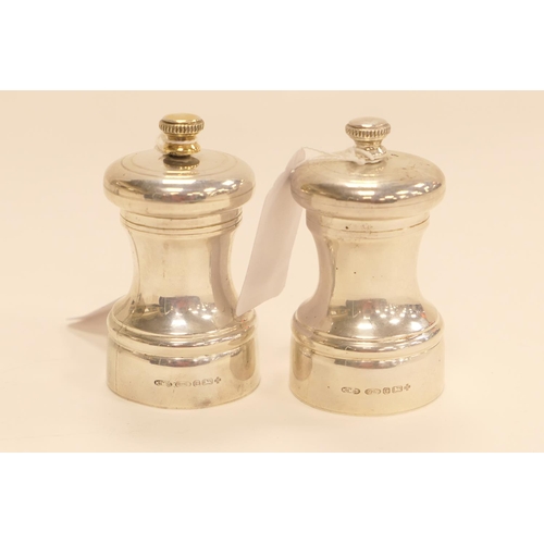 274 - Two modern silver pepper mills, Birmingham 2000, height 8cm