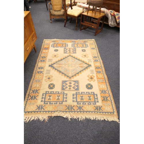 683 - Turkish cream ground woollen rug