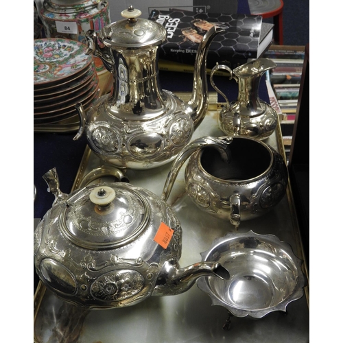 83 - Four piece silver plated tea and coffee service, handles require jointing; also a silver plated and ... 