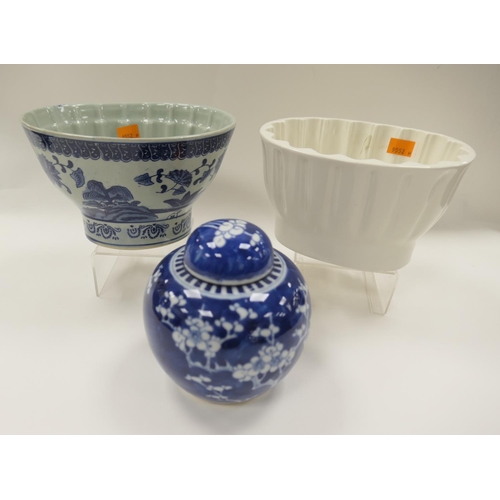 122 - Chinese blue and white Prunus pattern ginger jar and cover, height 15cm; also two modern jelly mould... 