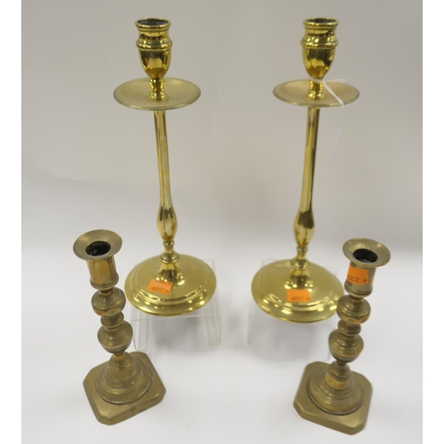 157 - Two pairs of brass candlesticks