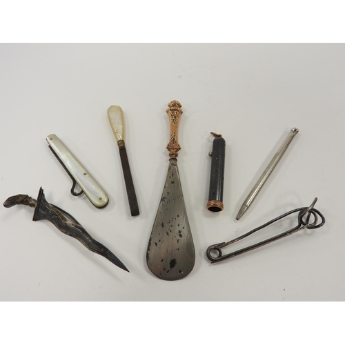 294 - 9ct gold mounted lady's shoe horn and a number of other items including a propelling pencil