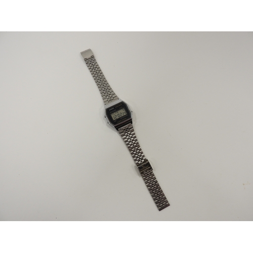 305 - Vintage Casio stainless steel alarm chrono wristwatch (593/A155W) currently in working order (see sp... 