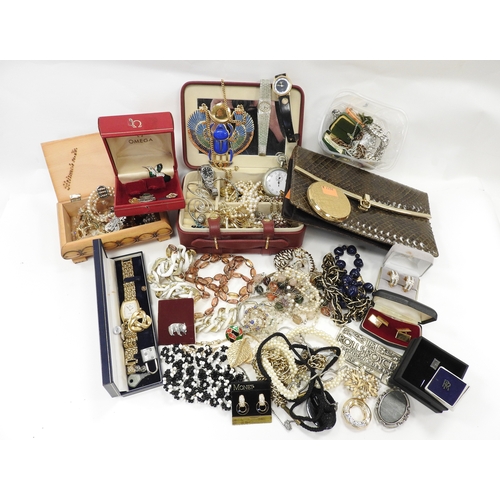 309 - Large quantity of mixed costume jewellery including Omega box, snakeskin clutch bag etc.