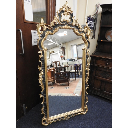 332 - Baroque style gilt and black floor standing cheval mirror, 170cm x 78cm