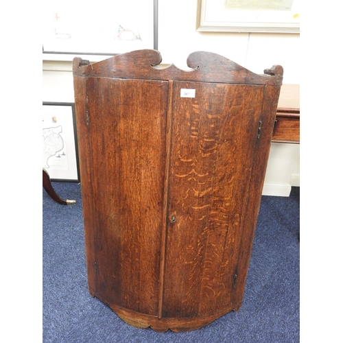 367 - 19th Century oak bow front hanging corner cupboard, height 98cm