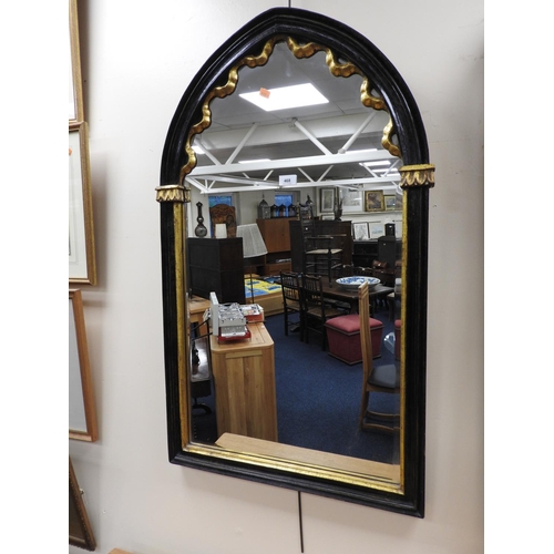 468 - Gothic style lancet shaped black and parcel gilt wall mirror, height 105cm, width 63cm