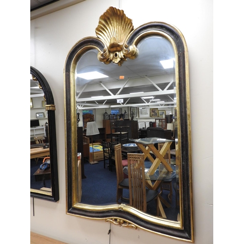 469 - Italian style black and gilt moulded wall mirror, height 130cm x 80cm