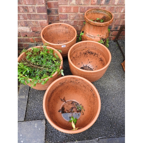 490 - Four terracotta jardinieres and a strawberry planter (5)