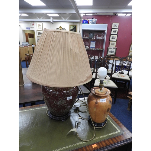 527 - Oriental style porcelain table lamp with claret ground and a turned wooden table lamp (2)