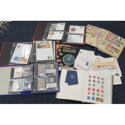 311 - Mixed world stamp collection in various albums including a number of first day covers and mixed roya... 