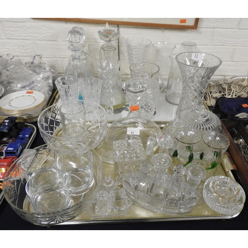 11 - Glassware including decanters, vases, cheese dish and cover, bowls and an unusual boat shaped cruet ... 