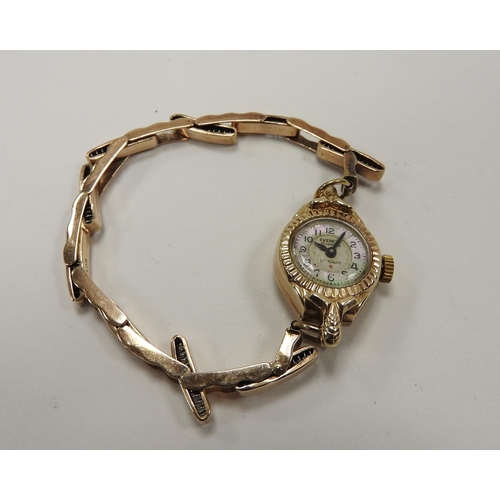 252 - Everest 9ct gold lady's vintage wristwatch on a later 9ct gold expandable bracelet, gross weight app... 