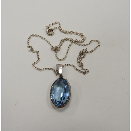 255 - Silver and blue gem stone pendant necklace