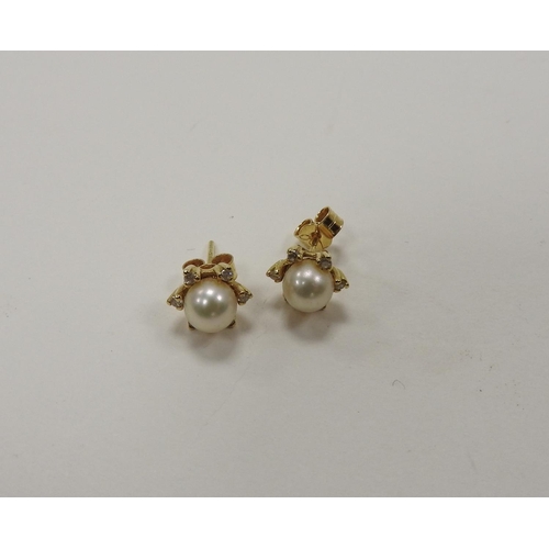 257 - Pair of cultured pearl and diamond ear studs in 18ct gold, pearls approx. 6 metric grains, gross wei... 