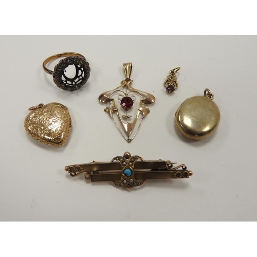 260 - Edwardian 9ct gold open work pendant centred with a garnet, 40mm drop, weight approx. 1g; also a 9ct... 