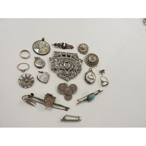 284 - Assorted silver and other white metal items including a part-nurses buckle, bar brooches, picture lo... 