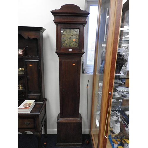 321 - Joseph Stockford, Thame, a George III oak thirty hour long case clock with brass 9