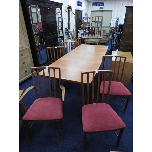 464 - McIntosh teak dining room suite comprising extending dining table, length when extended 234cm x 92cm... 