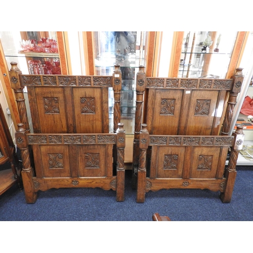 510 - Pair of quality reproduction oak carved single beds (no bed irons, Vono brackets attached), width 93... 