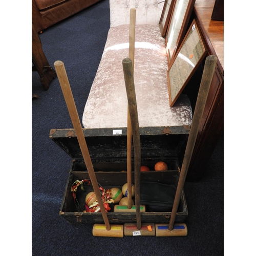 525 - Modern croquet set and boules contained within an ill fitting wooden box