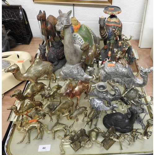 44 - Collection of mostly metal camel ornaments, others in resin etc. (2 trays)