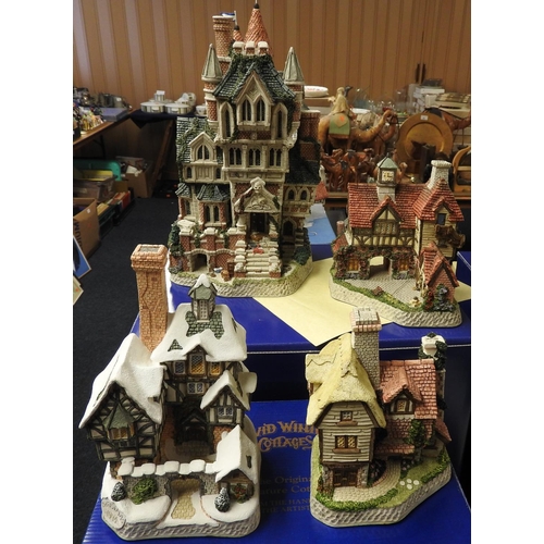 104 - David Winter limited edition 'Haunted House', boxed; also three further David Winter cottages includ... 