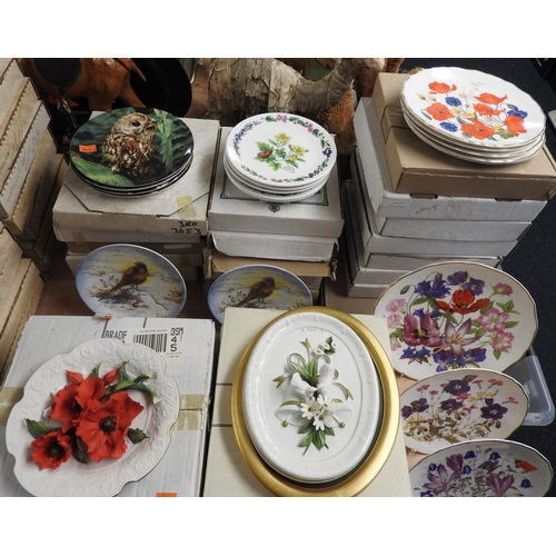 91 - Quantity of boxed collectors plates including floral relief wall plate and other botanical and natur... 