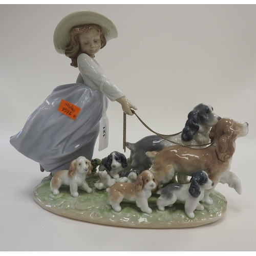 121 - Lladro Privilege figure of a young girl with spaniels 'Puppy Parade', height 25.5cm, boxed