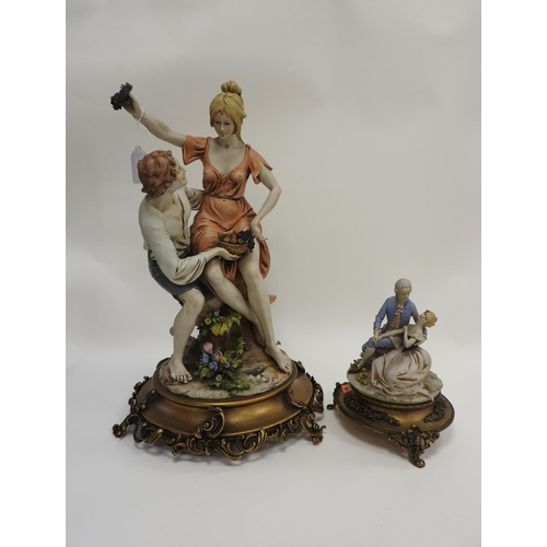 193 - Large decorative Capodimonte figure group 'Young Lovers' on a gilt metal base, height 49cm; also a s... 