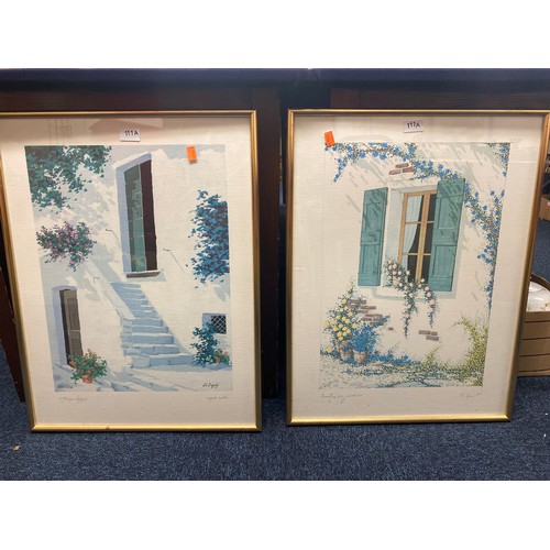 111A - G Zuppini, Mediterranean village scene, signed and framed print, and another similar print, indistin... 