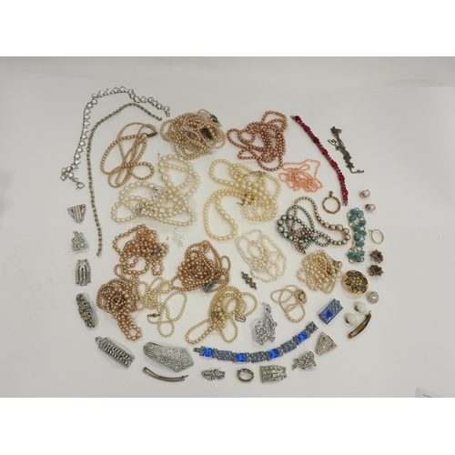 291 - Assorted costume jewellery including paste set clips, simulated pearl necklaces etc.