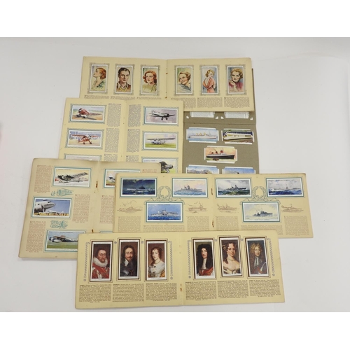 299 - Six cigarette card albums