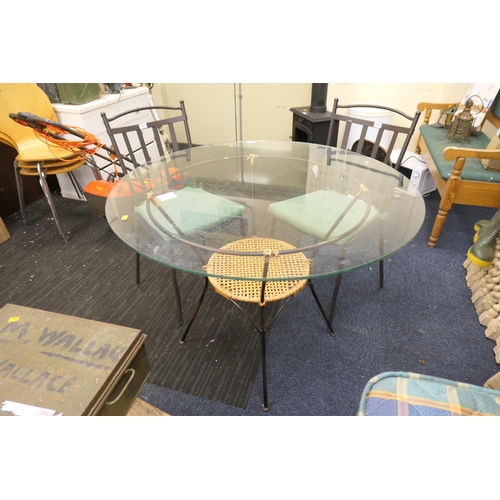 468 - Plate glass topped circular garden table with two metal framed chairs (3)