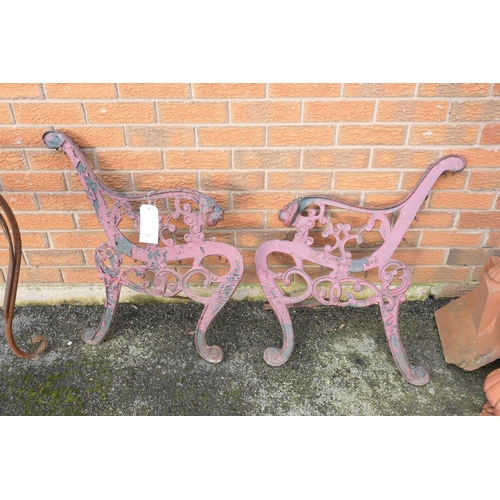 472 - Pair of cast iron garden bench ends, height 74cm