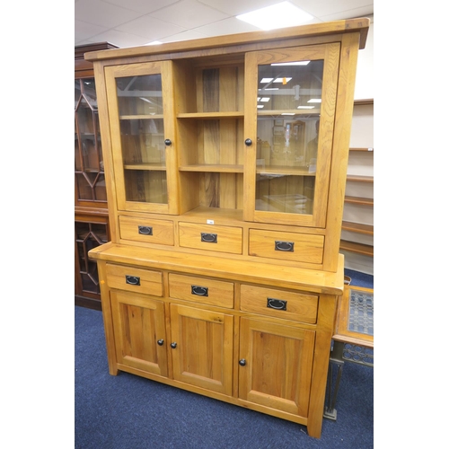 490 - Modern light oak glazed dresser, width 140cm, height 194cm, depth 47cm