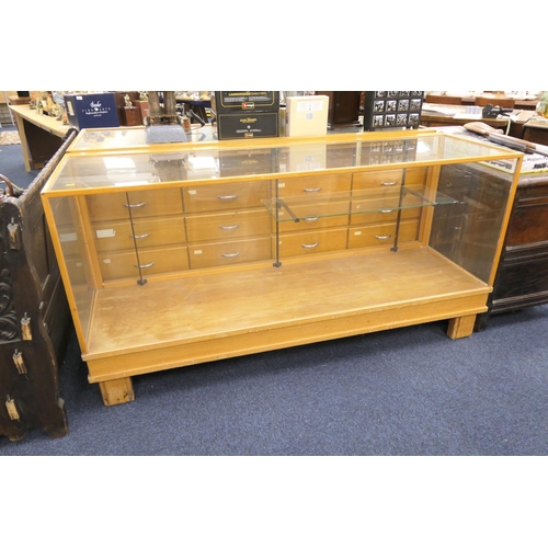 512 - Withy Grove Stores vintage beech framed shop cabinet, width 181cm, height 92cm, depth 58cm