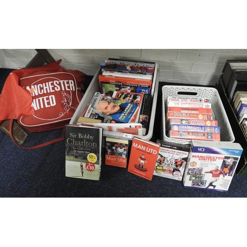 16 - Manchester United FC memorabilia including books, videos, bag and flags