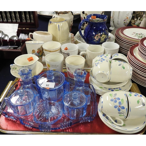 92 - Decorative ceramics and glassware including a blue moulded glass dressing table set, nursery beakers... 