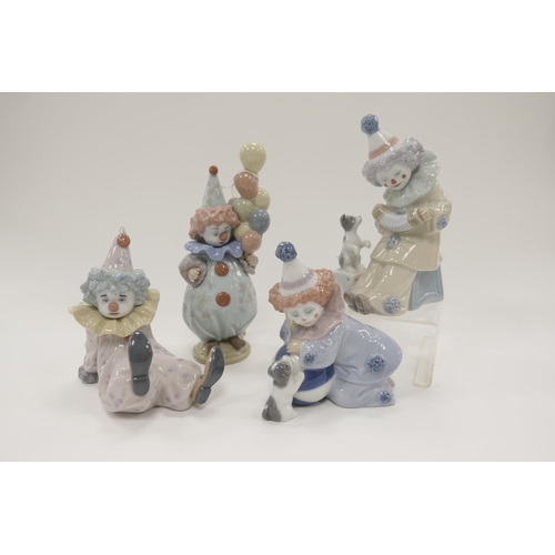 174 - Four Lladro porcelain figures 'Pierrot with puppy and ball', 'Pierrot with concertina', 'Littlest cl... 