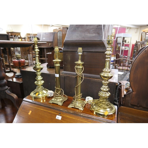 427 - Two pairs of modern brass table lamps, the largest 50cm to the electric fitting