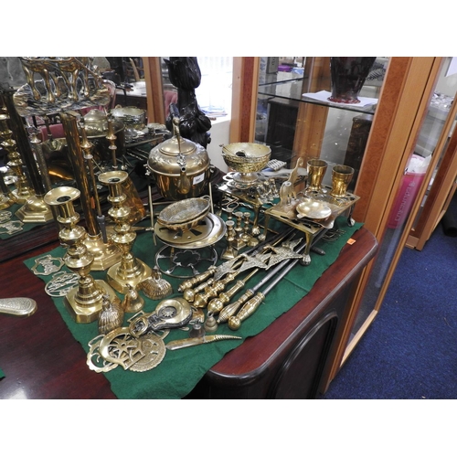 597 - Assortment of brass, copper and other metalware including companion stand, spirit kettle, trivets, c... 