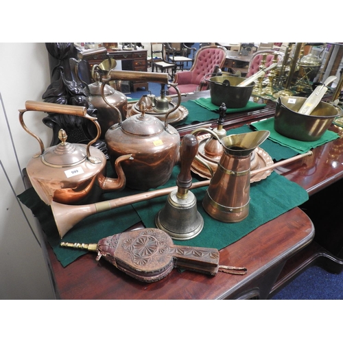 599 - Two Victorian copper kettles, Victorian hand bell, brass posthorn, small chip carved wooden bellows ... 