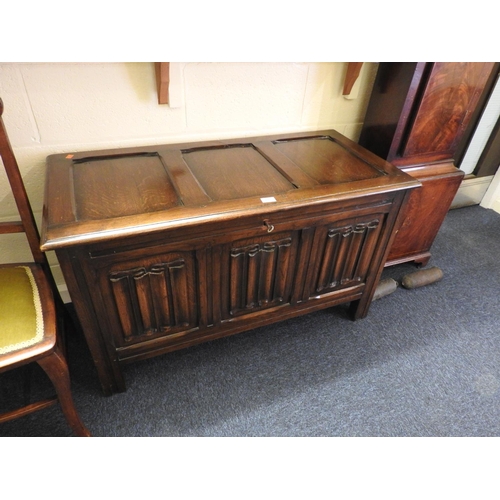 613 - Oak linenfold coffer or blanket chest with key, width 106cm, height 63cm